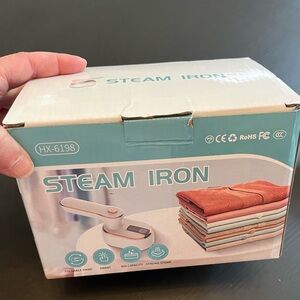 Handheld Steam Iron In Good Used Condition.